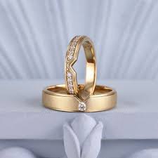 Elegant gold wedding bands for couples with diamond accents timeless jewelry set.