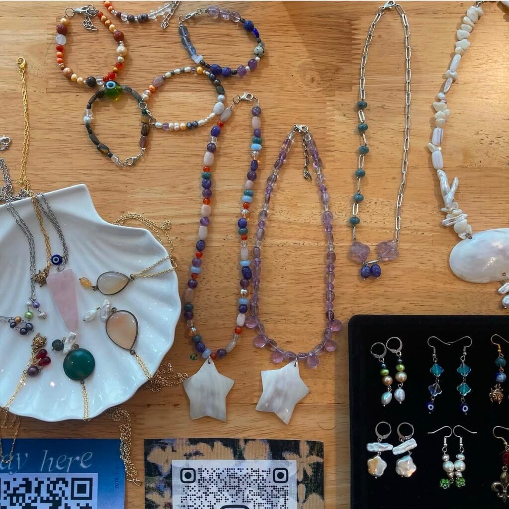 Colorful beaded jewelry set including necklaces, bracelets, and earrings handmade gemstone jewelry collection.